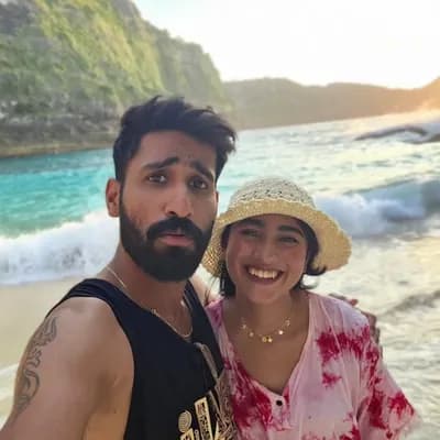 AI generated video: indian couple swimming
