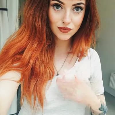 AI generated video: camera pans out quickly,  she lifts her top and, is topless naked and reveals her huge saggy breasts...