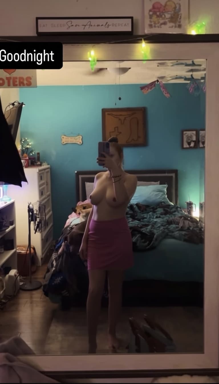 AI generated: Can you remove her bra and leave her with no top