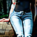 AI generated: a photo of a sexy, skinny, slim German 25 year old female with light blue eyes and short black curly...