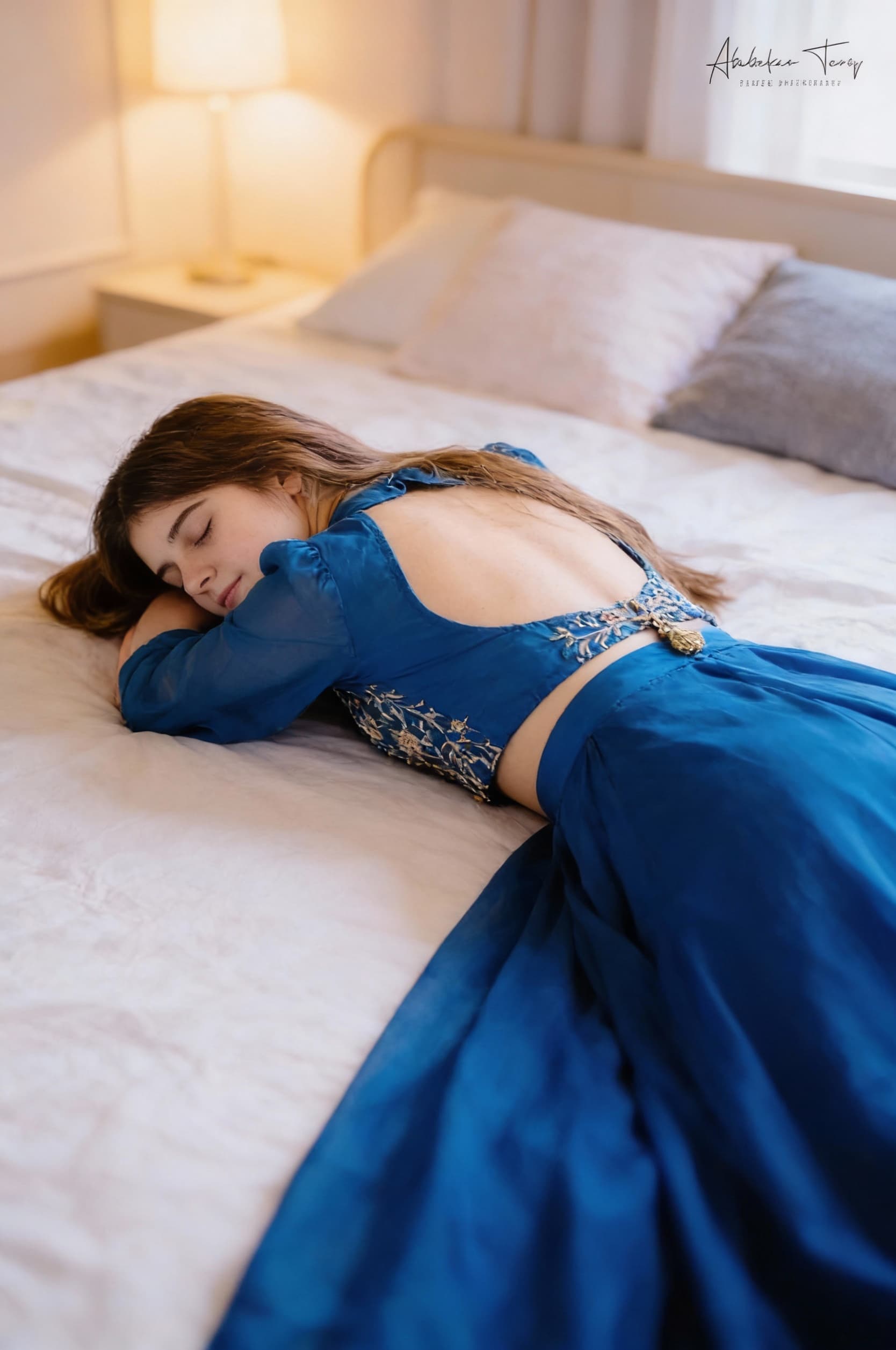 AI generated: This girl is sleeping face lying down on bedroom and showing her backless blouse in this similar dre...