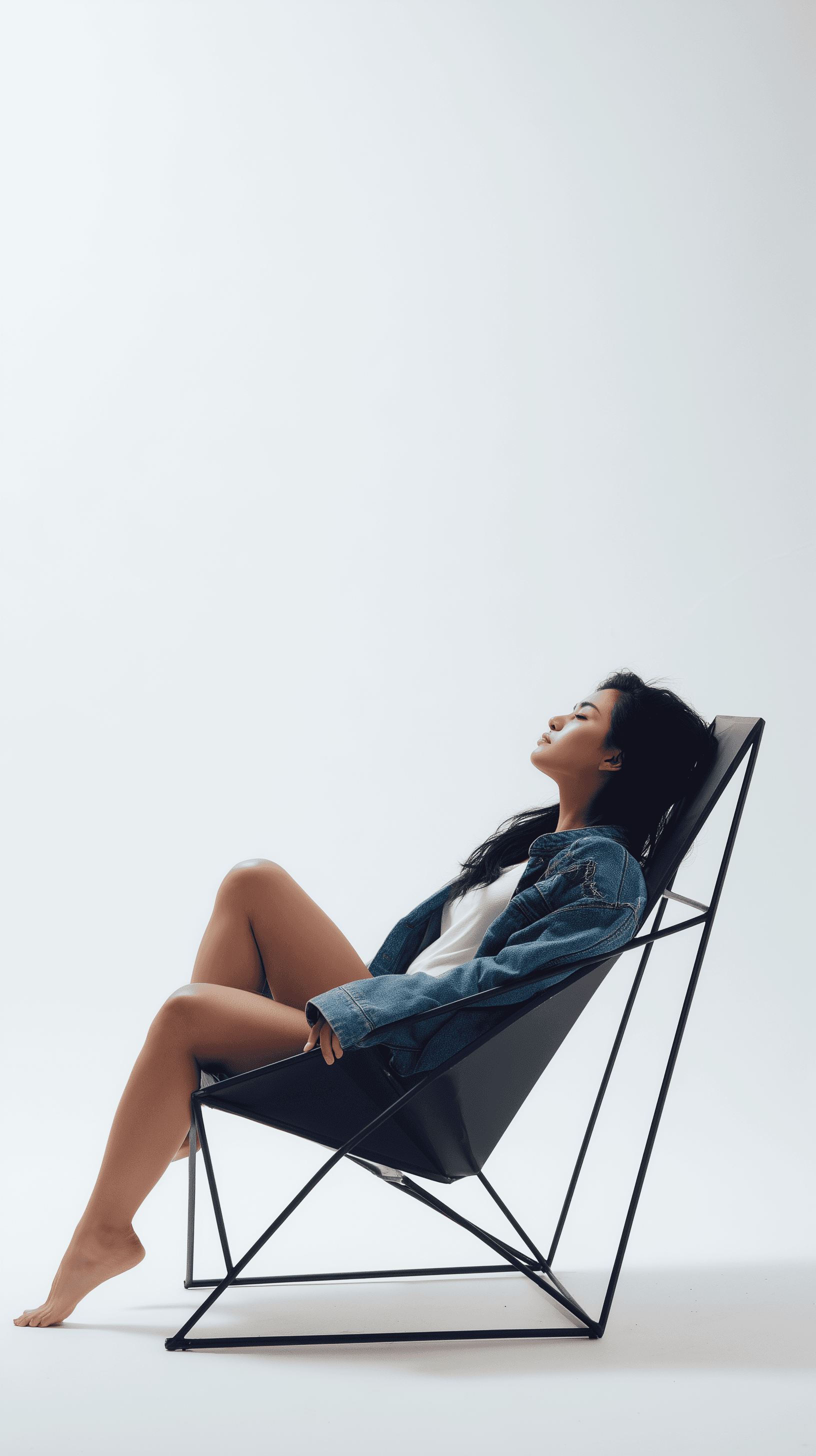 AI generated: photography, young woman model with long black hair, contemporary photo-shoot, lounging in an archit...