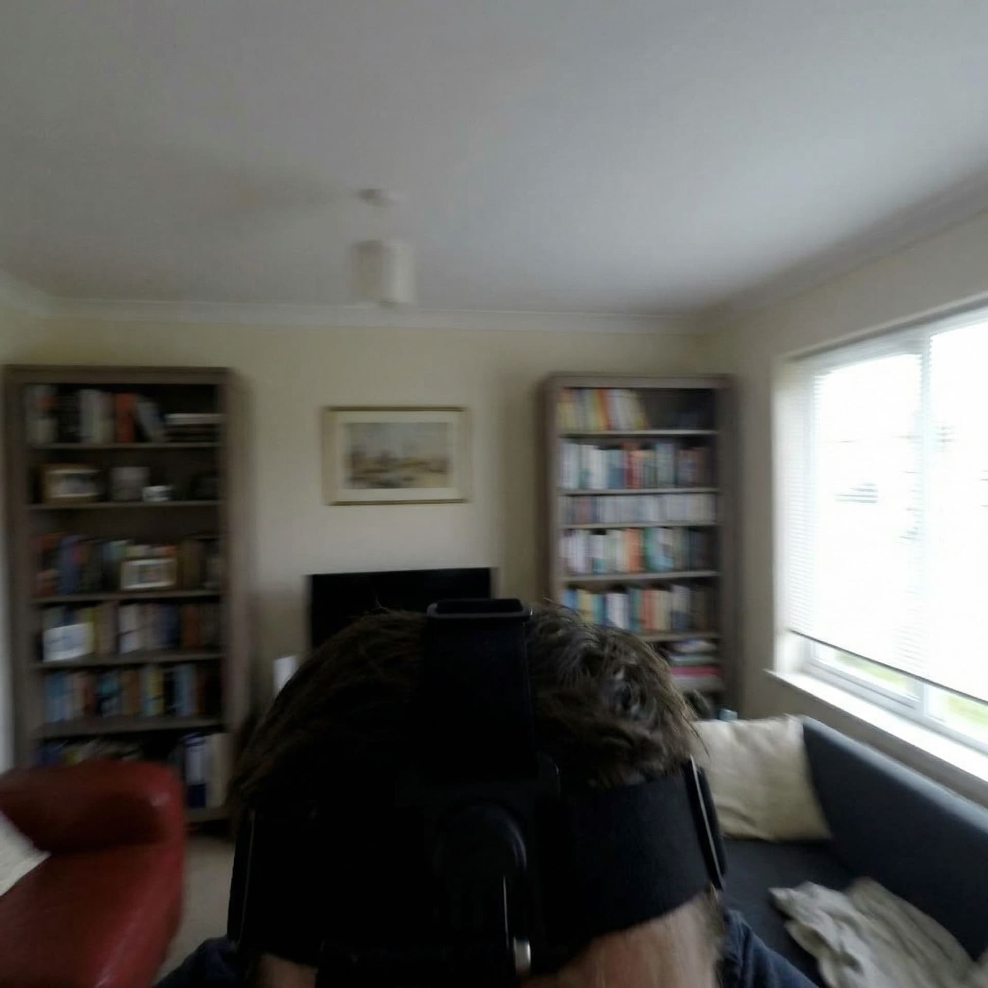 AI generated: “A person moves their head up and down rapidly in a continuous, repetitive motion from a first-perso...