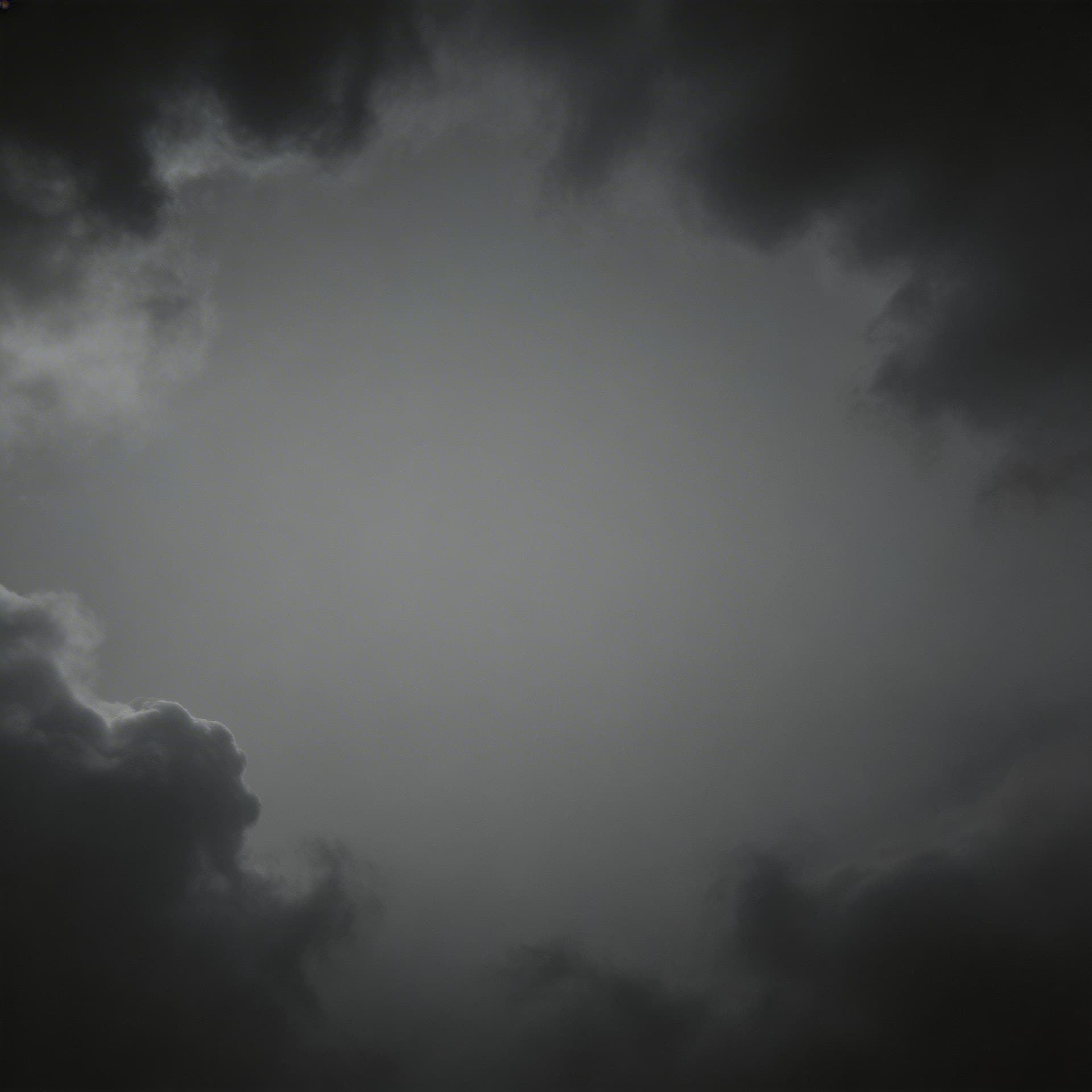AI generated: dark stormy clouds background, subtle fog, dramatic cinematic lighting, deep shadows around edges, s...