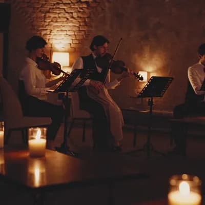 AI generated video: candlelight concert in cozy environment in front of a brick wall
