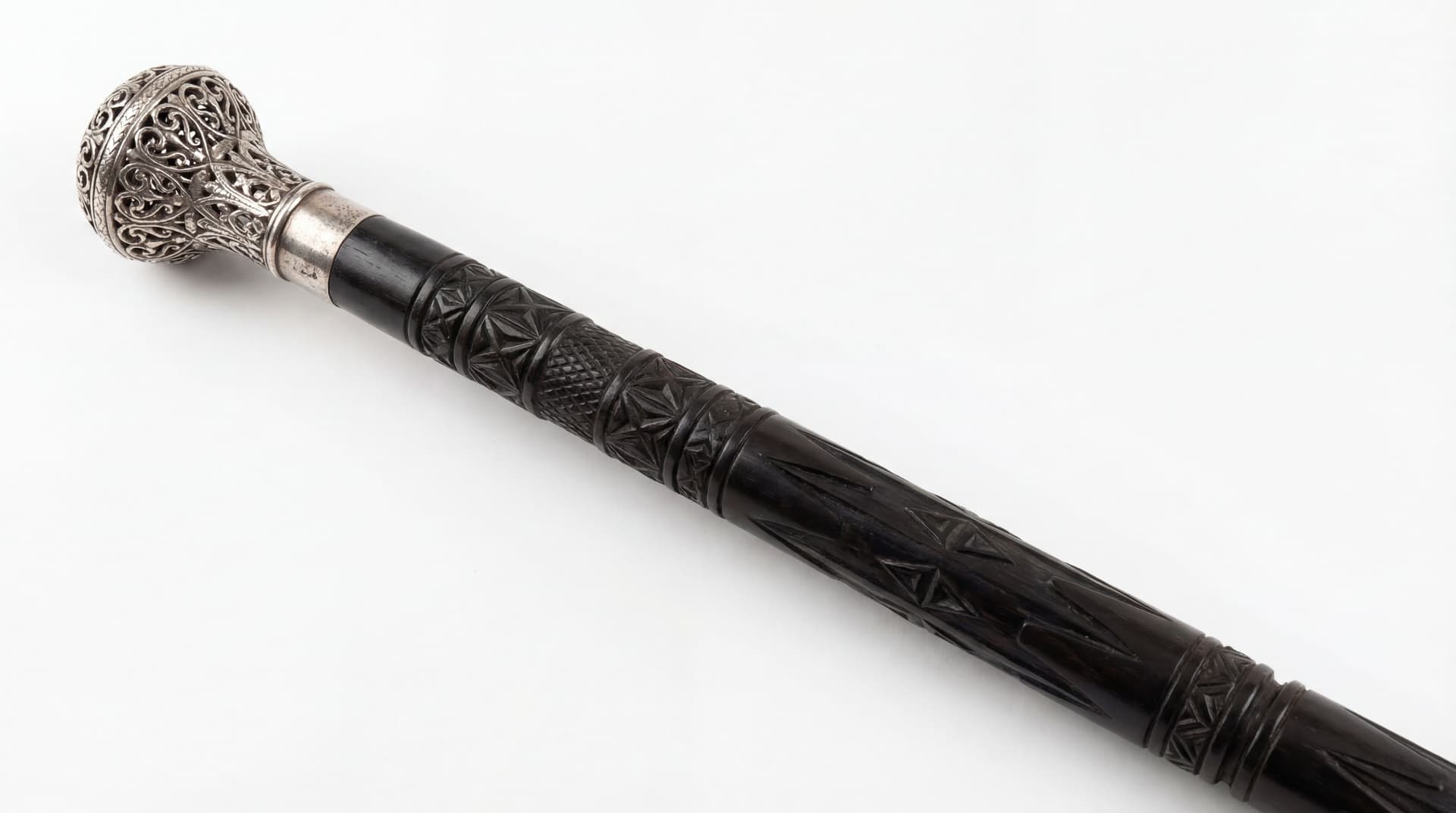 AI generated: Intricate Walking Stick: A tall, dark wood cane with an ivory or silver handle. Tippu Tip is often d...