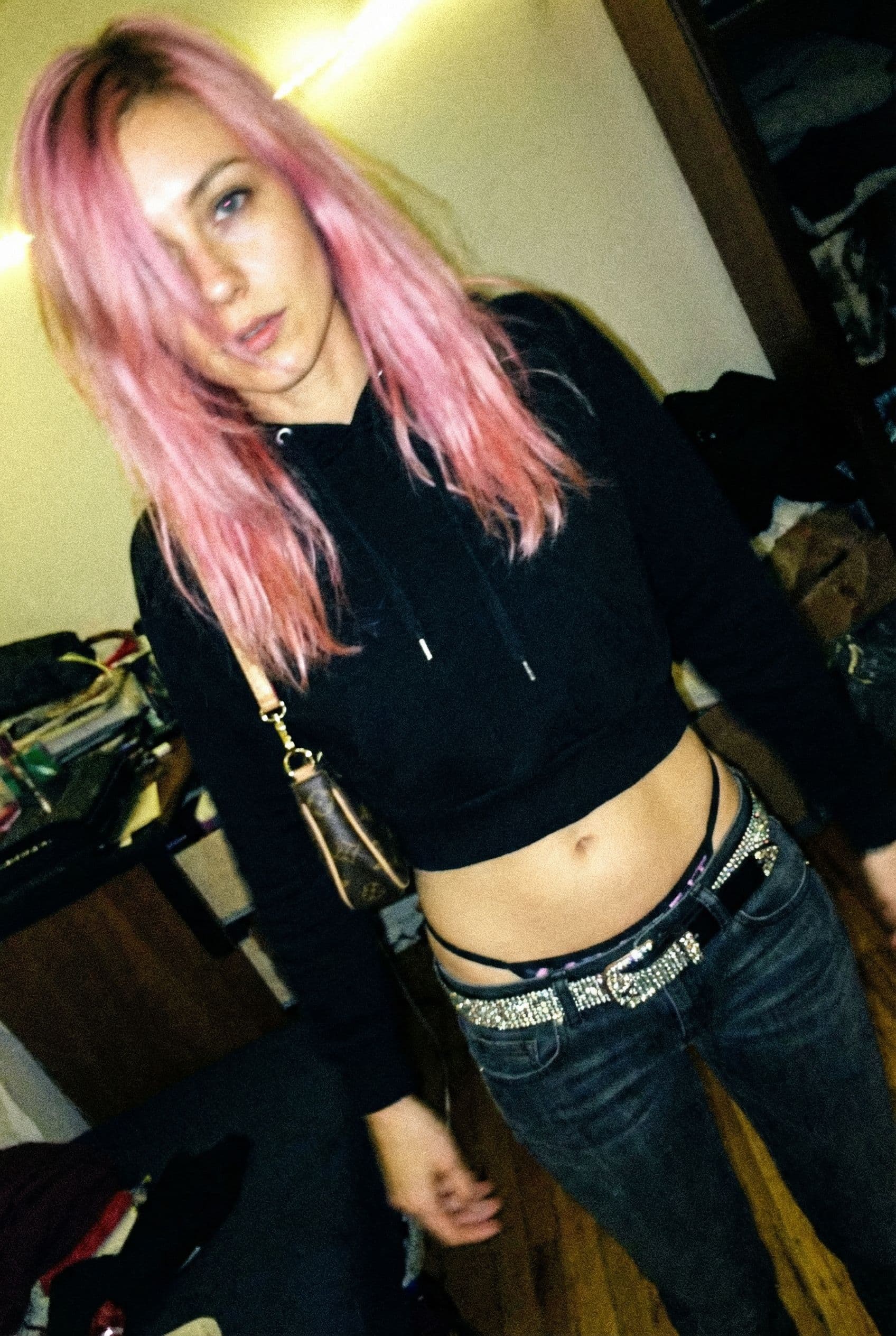 AI generated: a lo-fi 2015s-era, diagonally taken, low-quality iPhone photo of a 20-year-old baddie. The shot is i...
