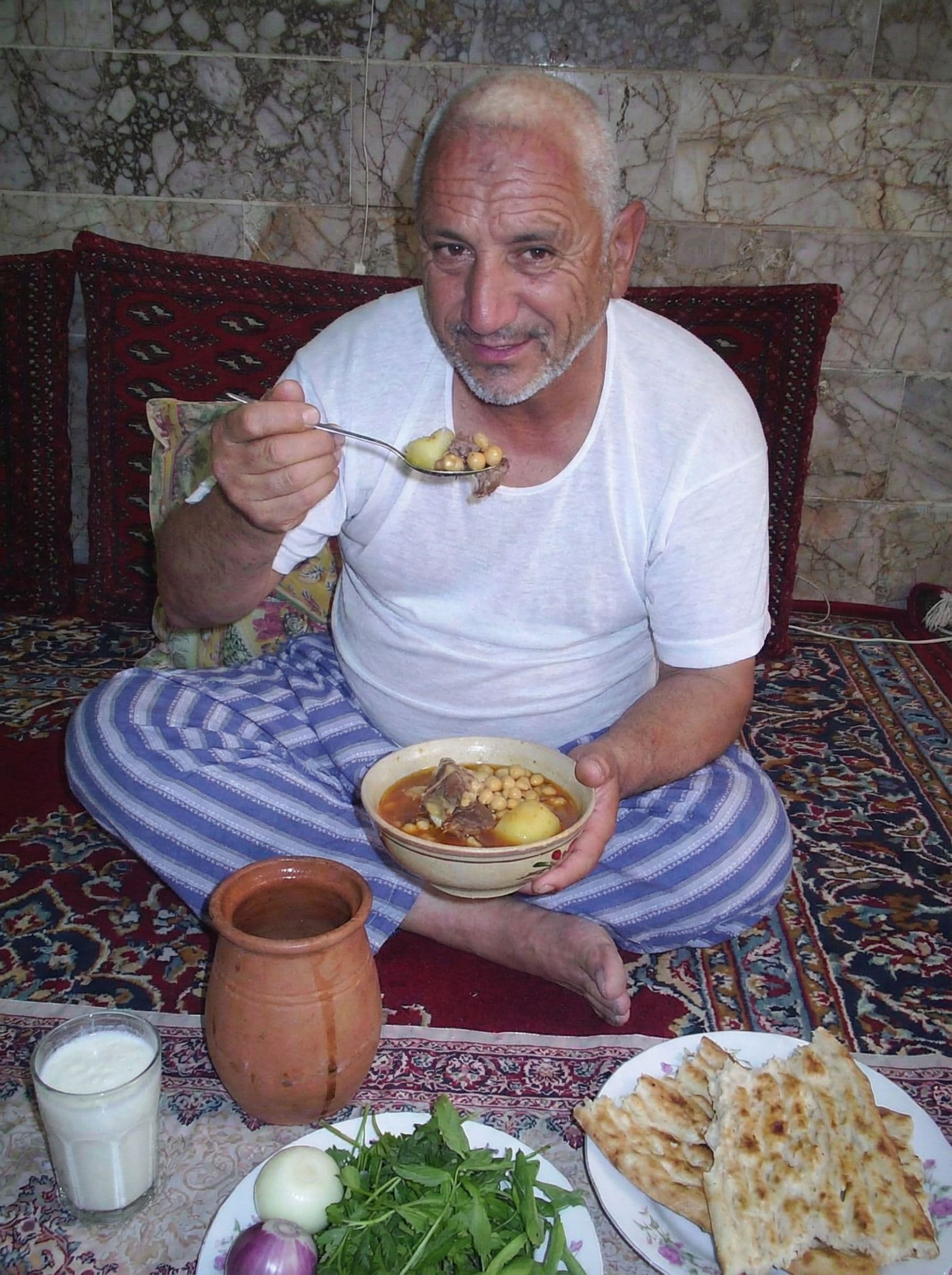 AI generated: در حال خوردن آبگوشت بز باش
