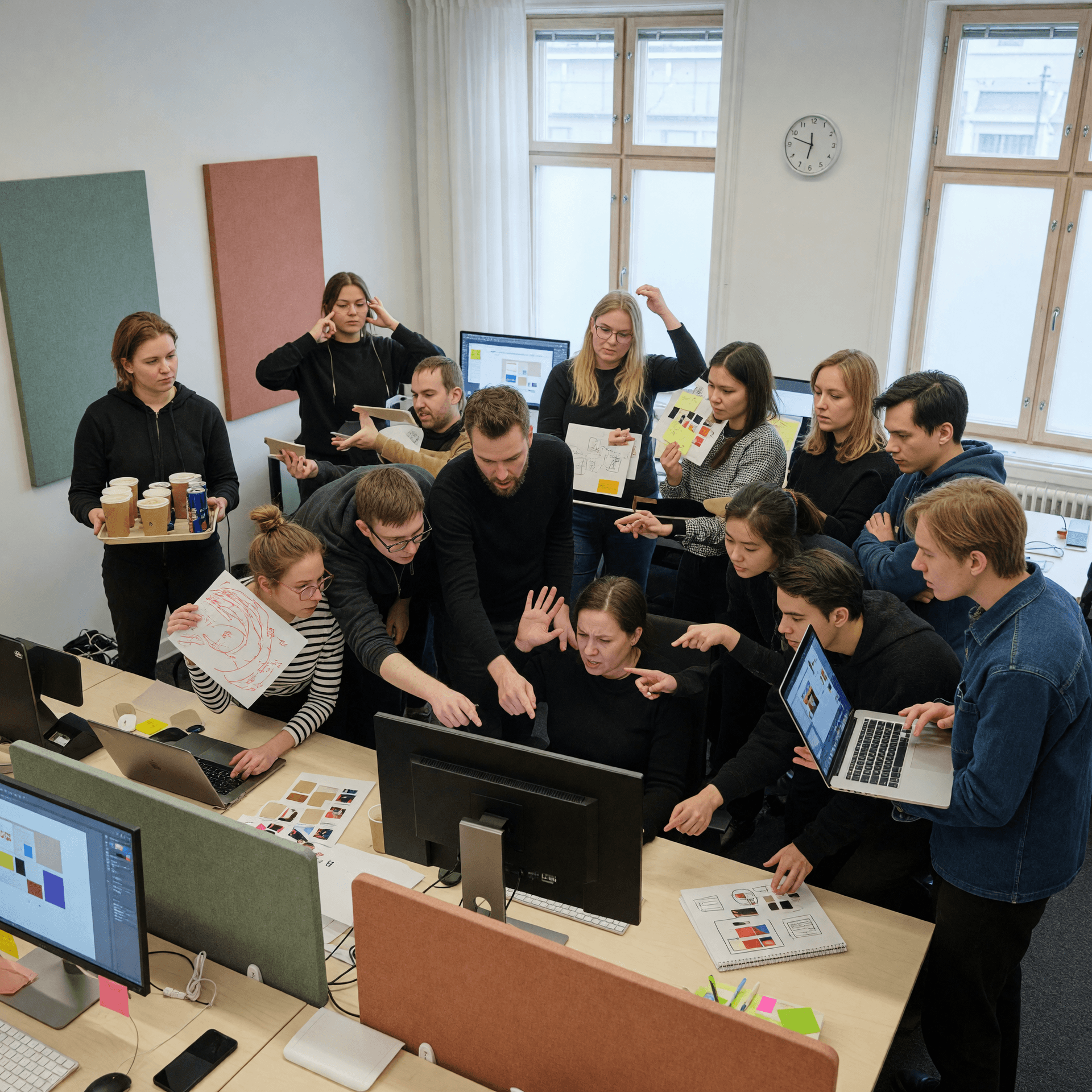 AI generated: A hyper-realistic modern creative agency office during a deadline. One experienced designer sits at ...