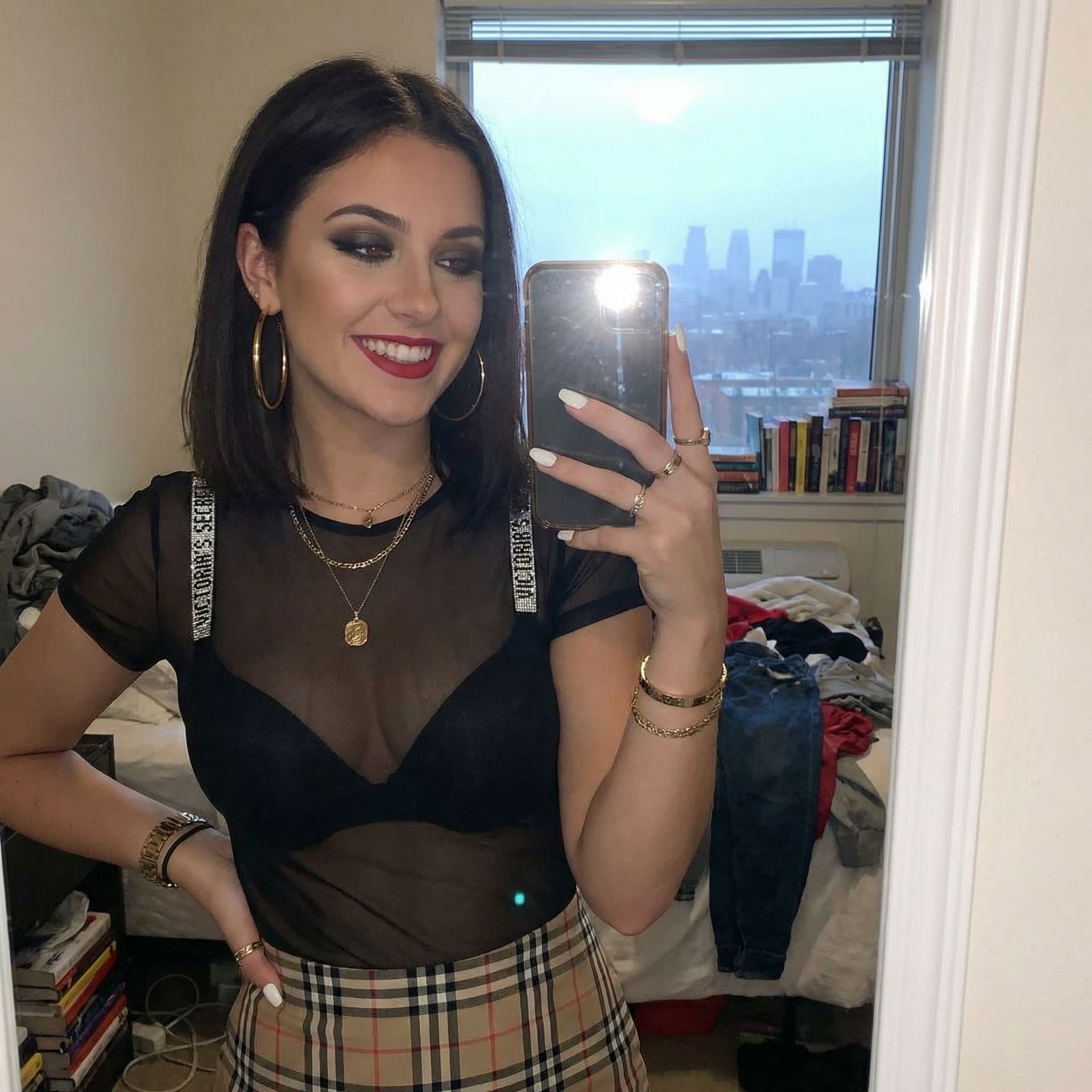 AI generated: A beautiful 22 year old women takes a mirror selfie in a messy woman's bedroom of an apartment. The ...
