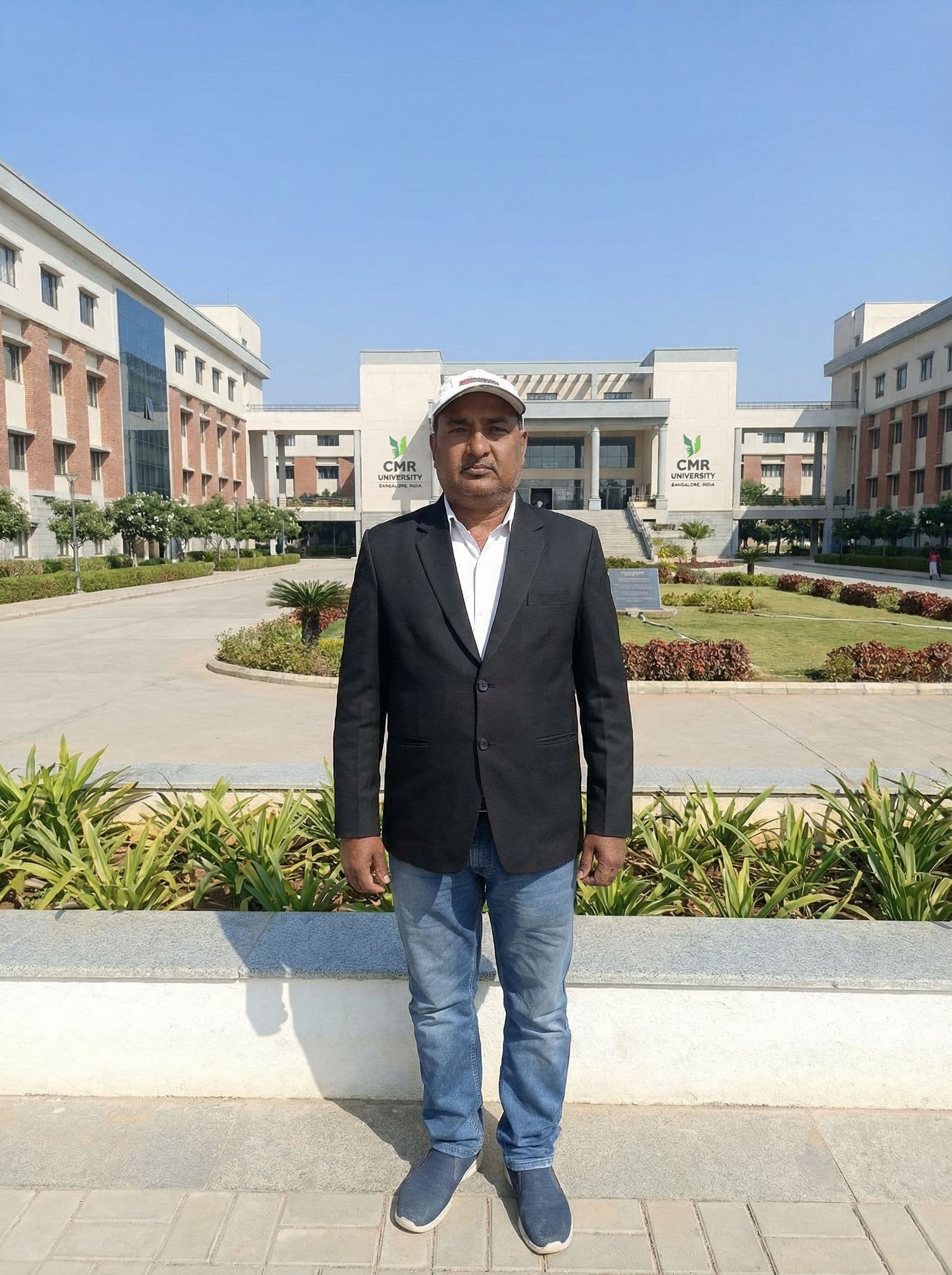 AI generated: Add father photo with me in cmr University put in black coat in my father 