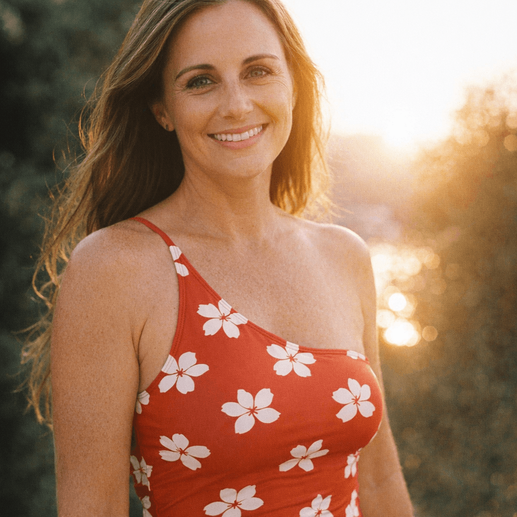 AI generated: A 35mm film photograph of a woman in her 40s, wearing a tight single-shoulder swimsuit with a spaghe...