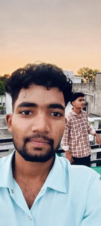 AI generated video: "A young man taking a selfie on a rooftop during golden hour sunset. The camera slowly moves forward...