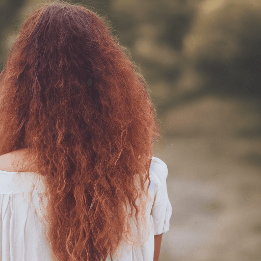 AI generated: Portrait of a beautiful lady, with natural color hair, view from back, film grain, high quality, stu...