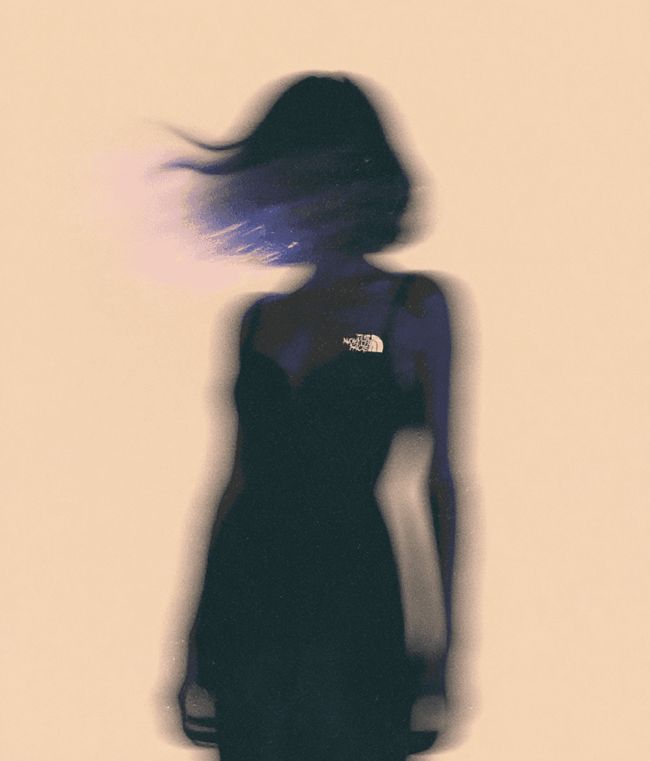 AI generated: A surreal, low-angle portrait of a woman dressed in an eveningwear elegant black dress, standing in ...