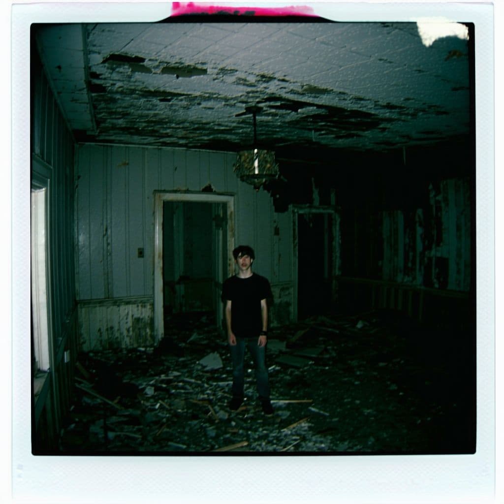 AI generated: grainy 80's photograph quality polaroid of smosh suicide caught in an abandoned house, dark