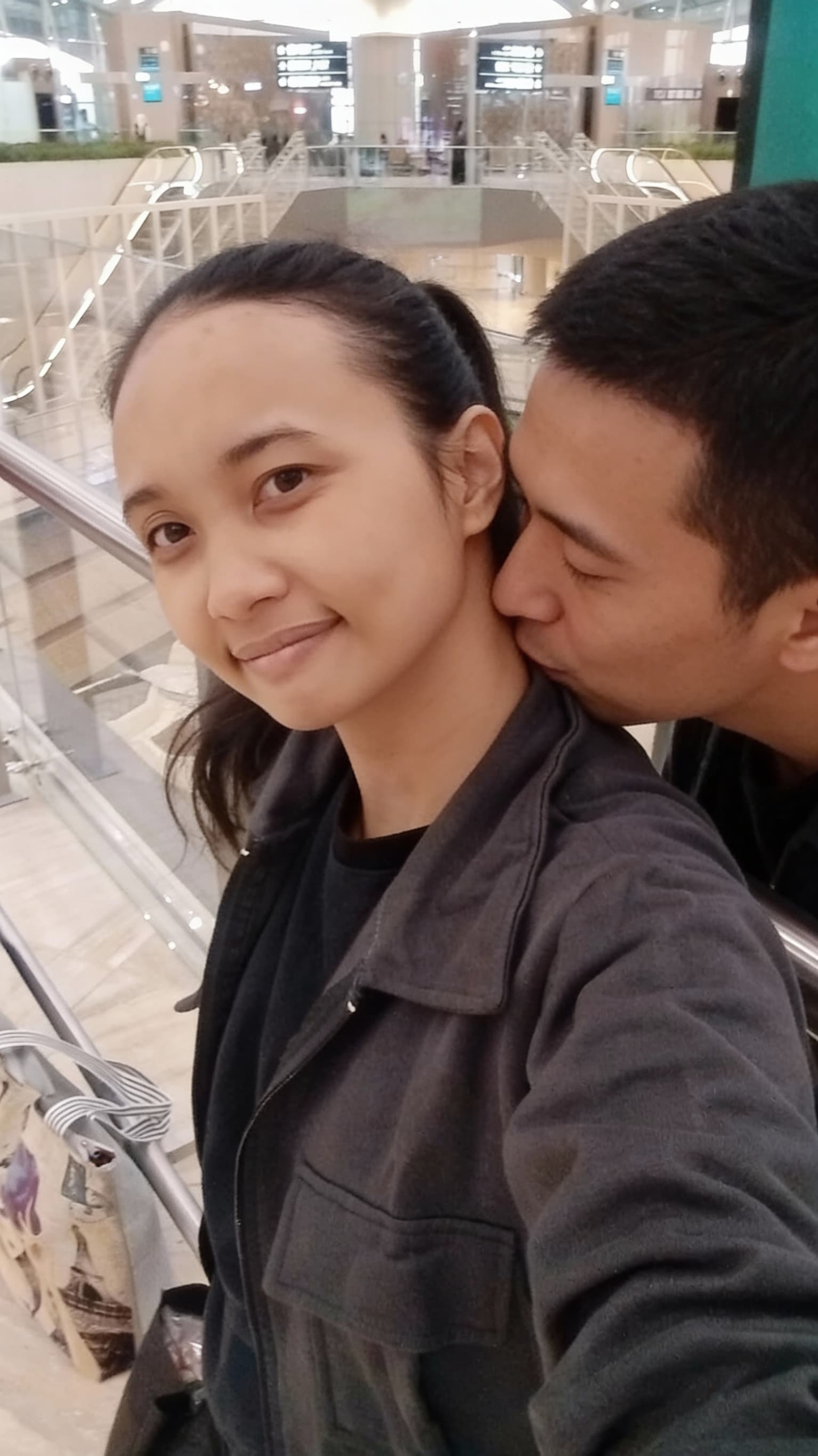 AI generated: The man kissing on her neck