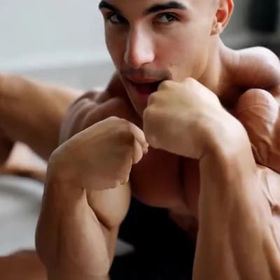 AI generated video: Stretching legs out resting heels on floor flexing both biceps looking at left bicep then looking at...