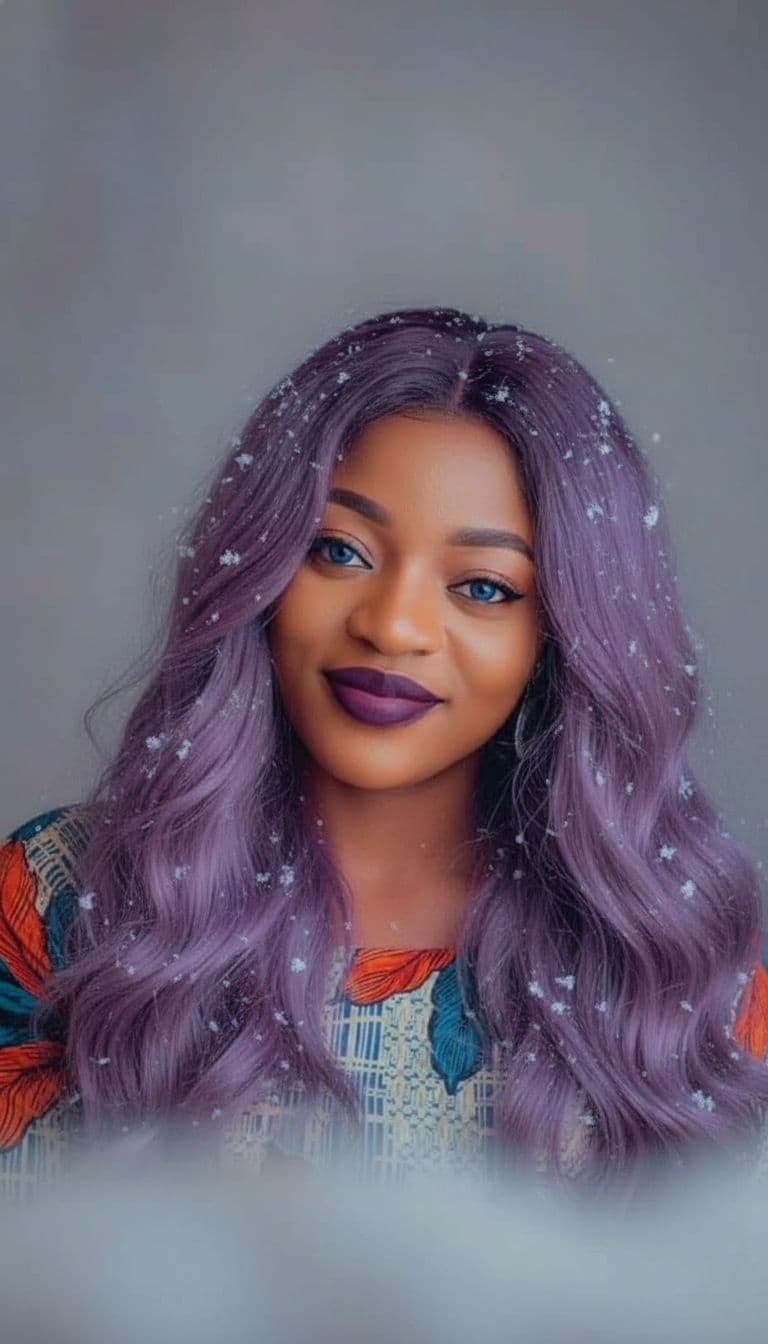 AI generated: A close-up portrait of a person with wavy, lavender purple hair dusted with snowflakes, piercing blu...