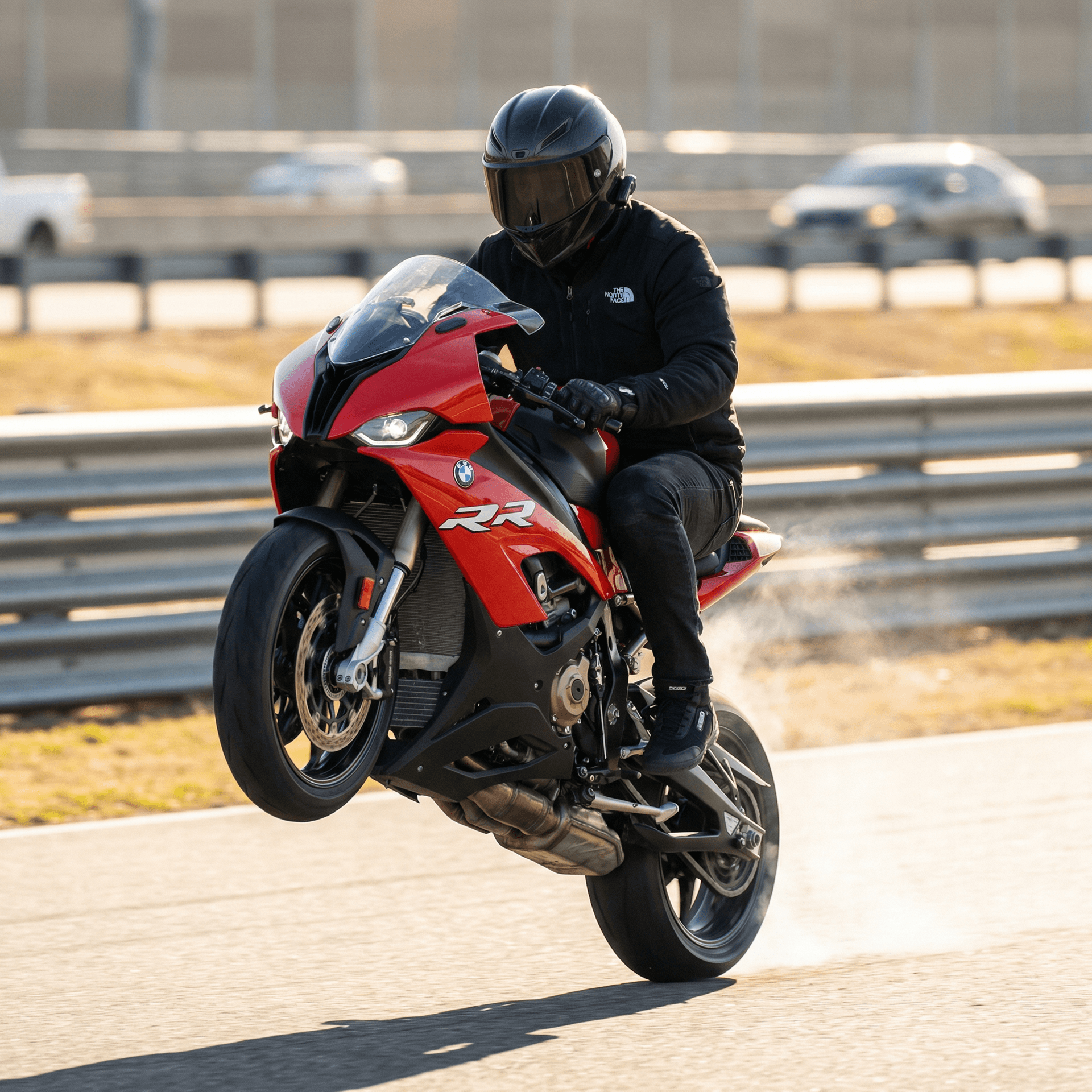 AI generated: A high-energy scene featuring a rider performing a wheelie on a sleek ( uploaded motorcycle), set on...