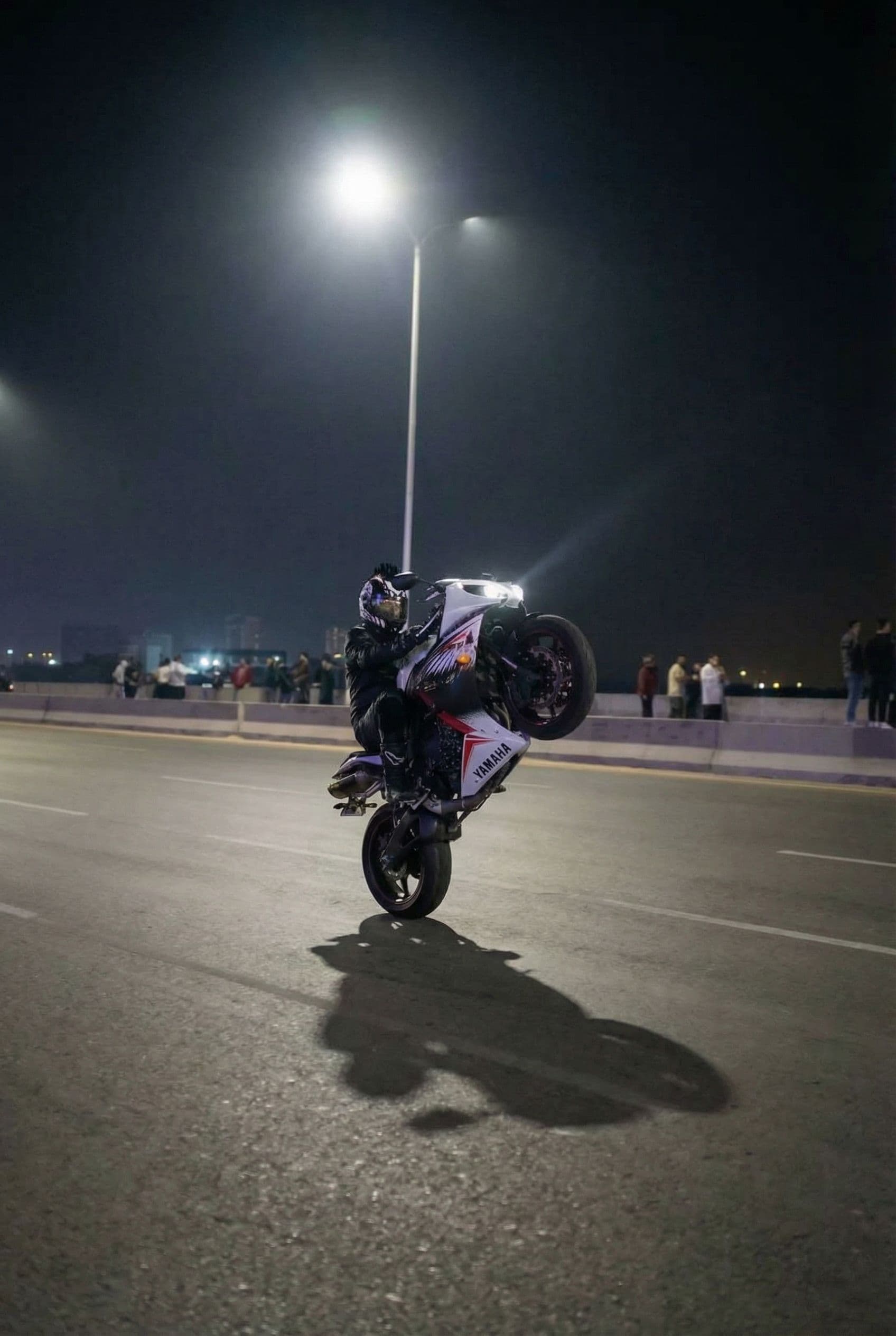 AI generated: wheelie more high top of the bike look vertical to the sky wheelie