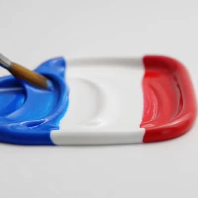 AI generated video: A hyper-realistic macro shot of a paintbrush creating a thick textured paint stroke on a clean white...