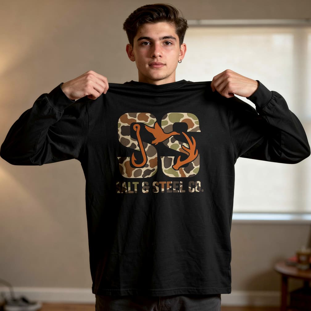 AI generated: male tiktok influencer holding up the uploaded back side up a long sleeve tshirt 