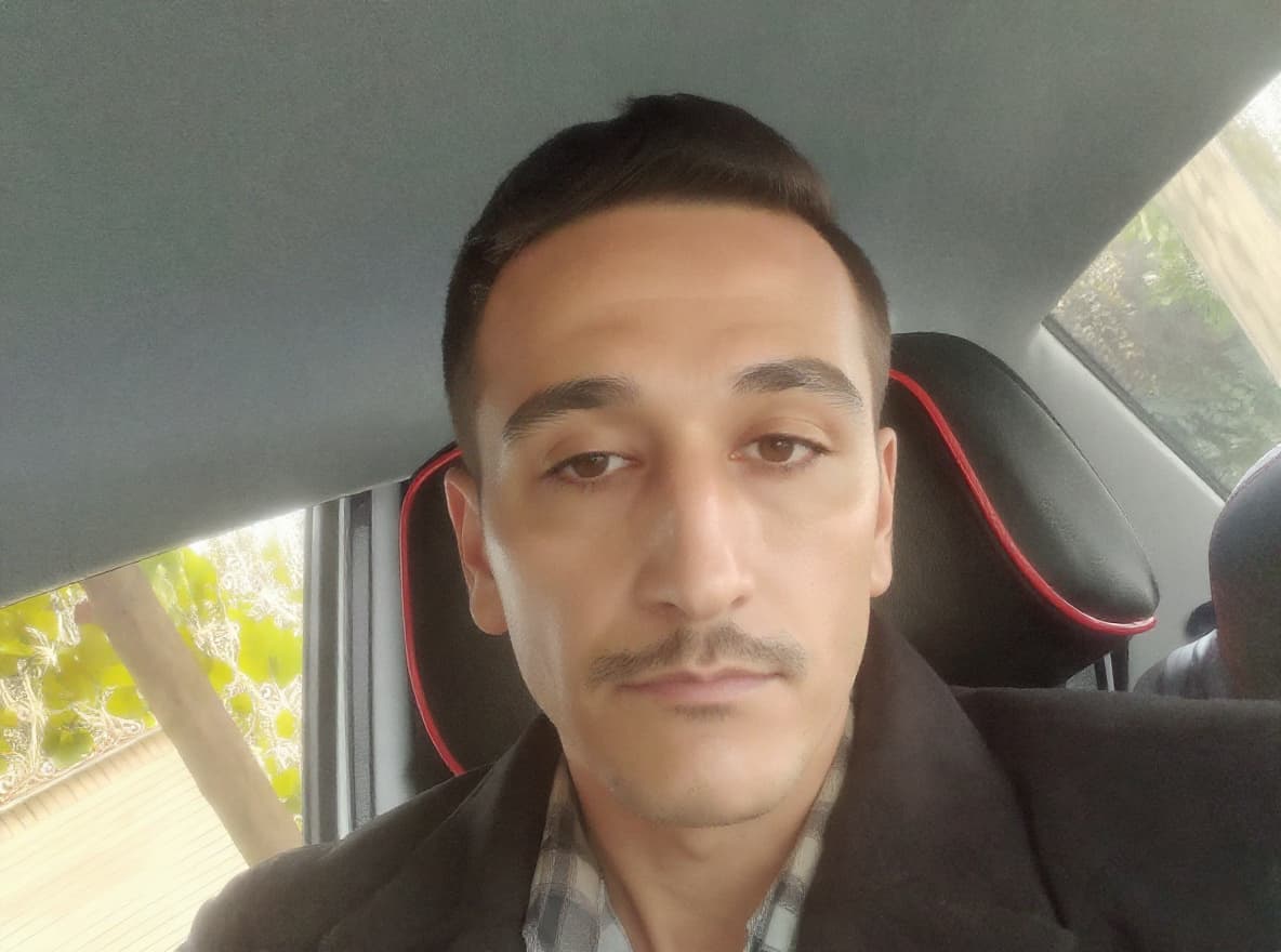 AI generated: 
Here's a detailed midjourney prompt based on the image you provided:

"Portrait of a man deeply foc...
