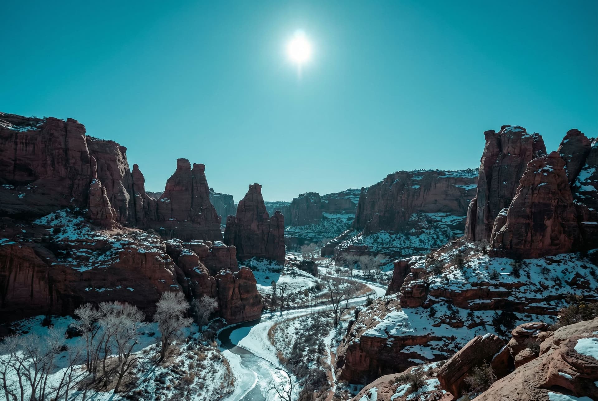 AI generated: a scenic landscape within a deep canyon with rock formations but the sky has a more teal  color  wit...