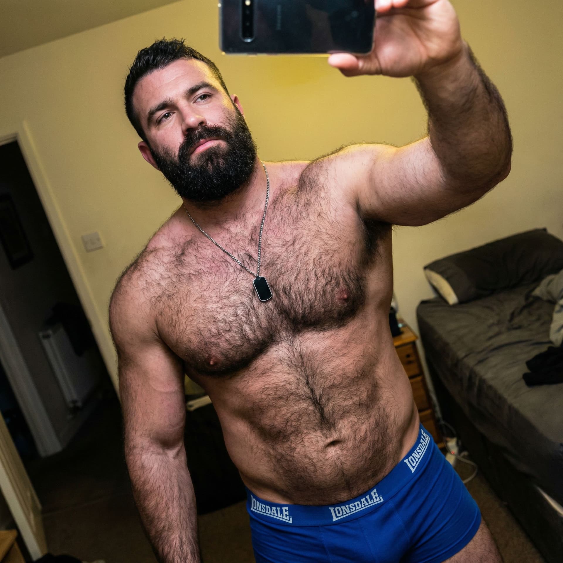 AI generated: Raw candid unposed smartphone selfie of a rugged 30-year-old white man, extremely muscular and thick...