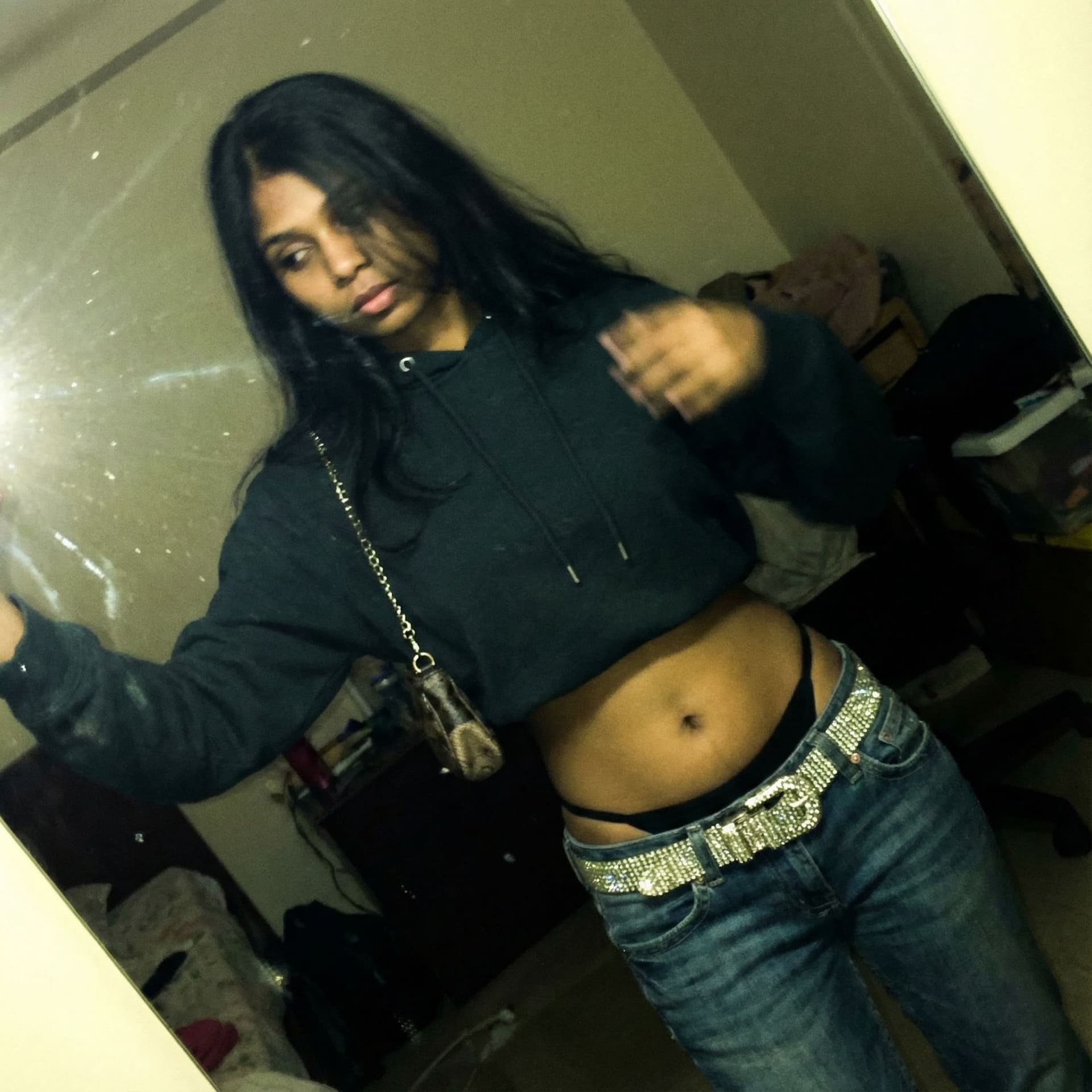 AI generated: a lo-fi 2015s-era, diagonally taken, low-quality iPhone photo of a 20-year-old baddie. The shot is i...