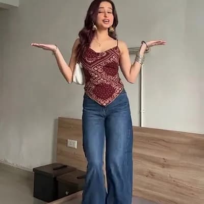 AI generated video: Create a dance reel of this girl on an indian song 'titli' from the movie chennai express and take r...