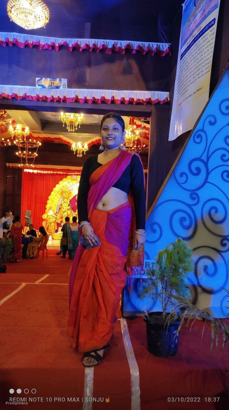 AI generated: Showing navel by lifting up top saree