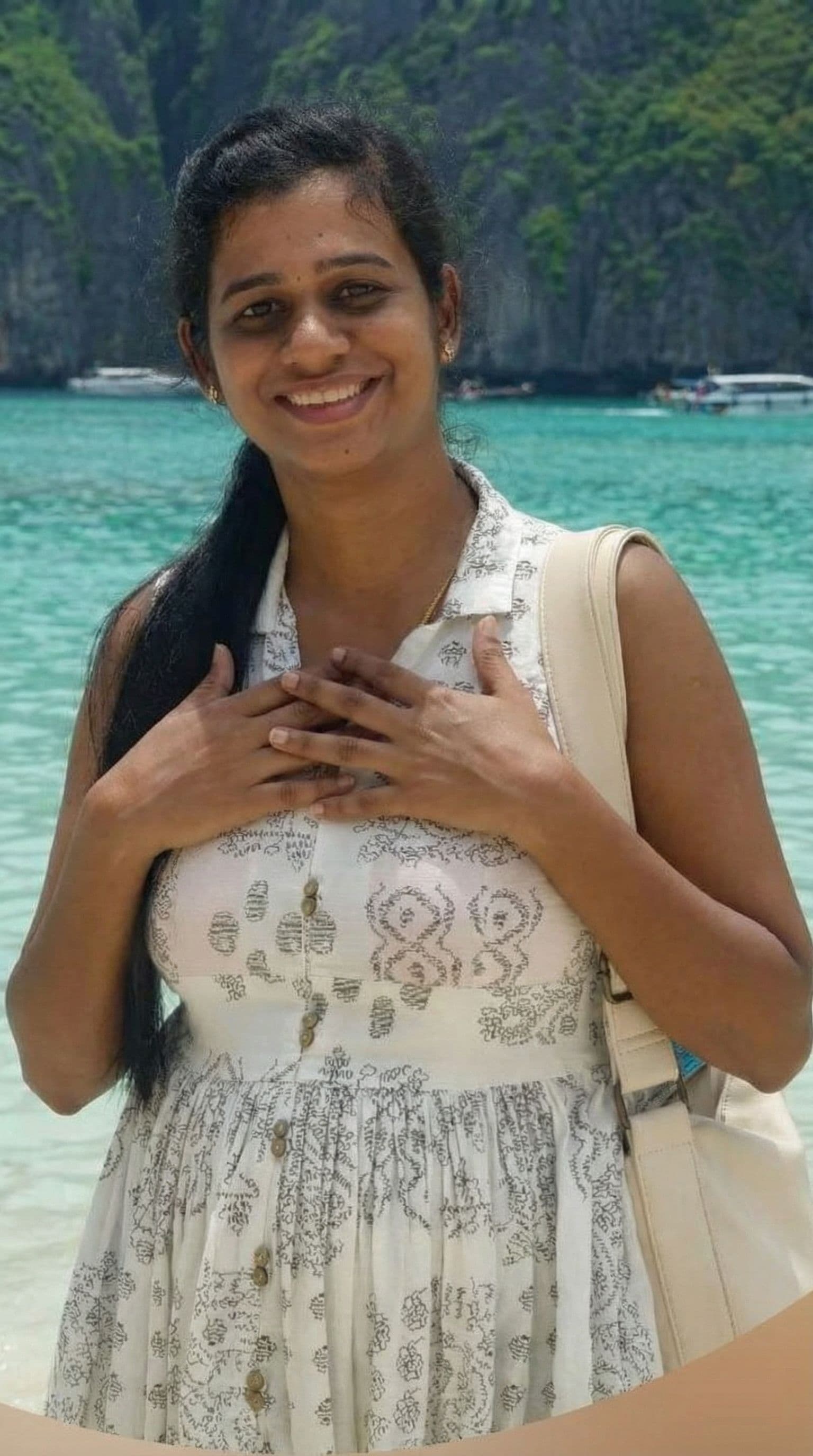 AI generated: Both hands covering her breast 
