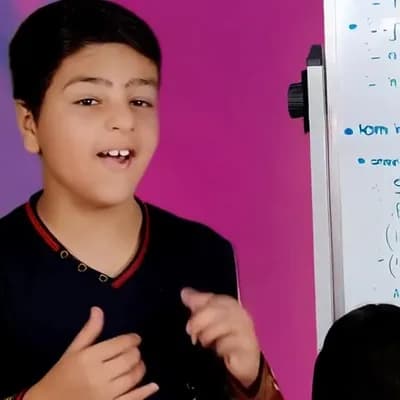 AI generated video: A boy explaining Simple present tense in front of a class