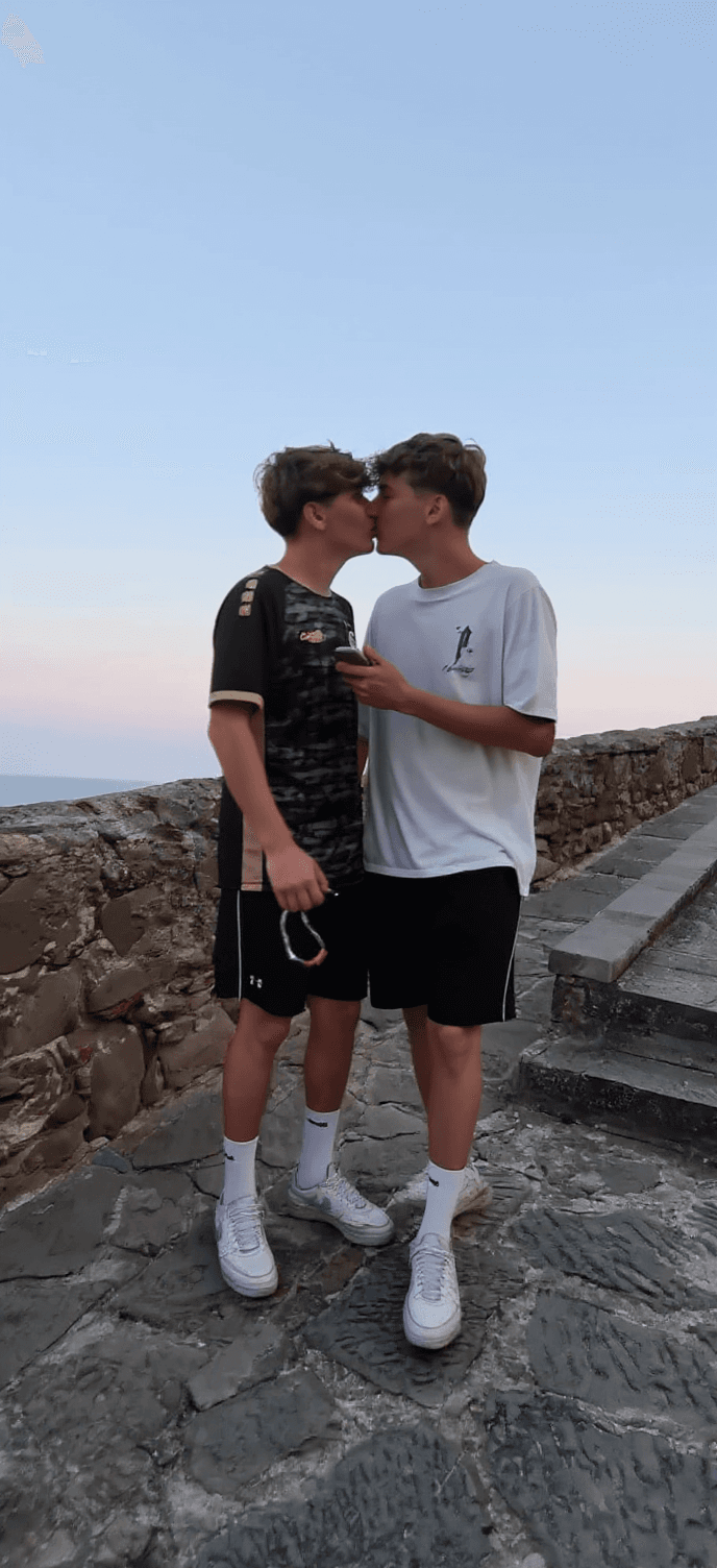 AI generated: The guys share a romantic kiss.