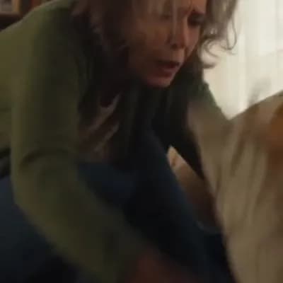 AI generated video: An elderly woman, around 60s, with kind wrinkles and grey-streaked hair, is frantically searching he...