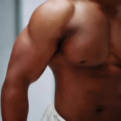 AI generated video: Flexing biceps smiling and walking towards me