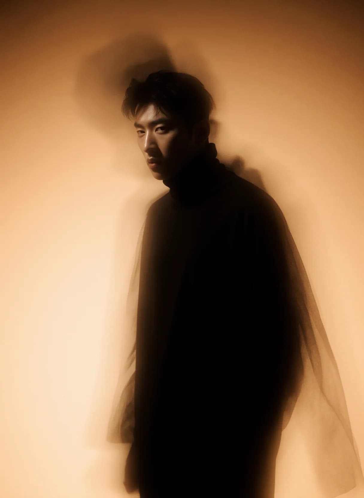 AI generated: A man stands against a warm, gradient background, bathed in soft, diffused light that creates a dram...