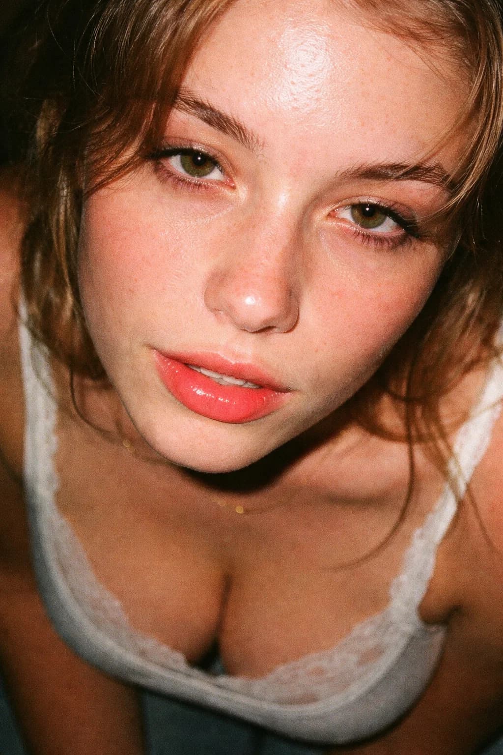 AI generated: (SORA)
amateur film photo

close-up of a face

skin normal
but pores slightly too deep
as if surface...