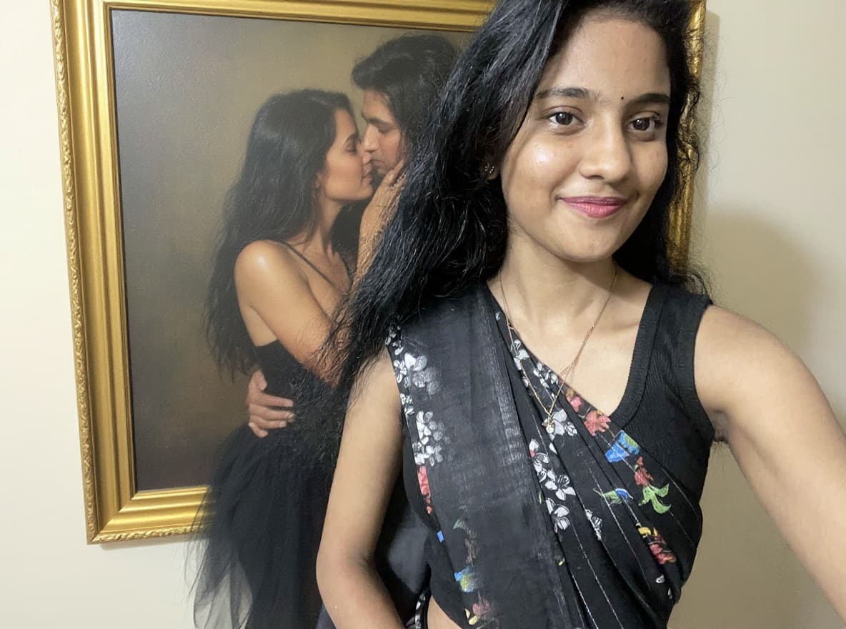 AI generated: make her dress disheveled and kissing and hugging a guy passionately 