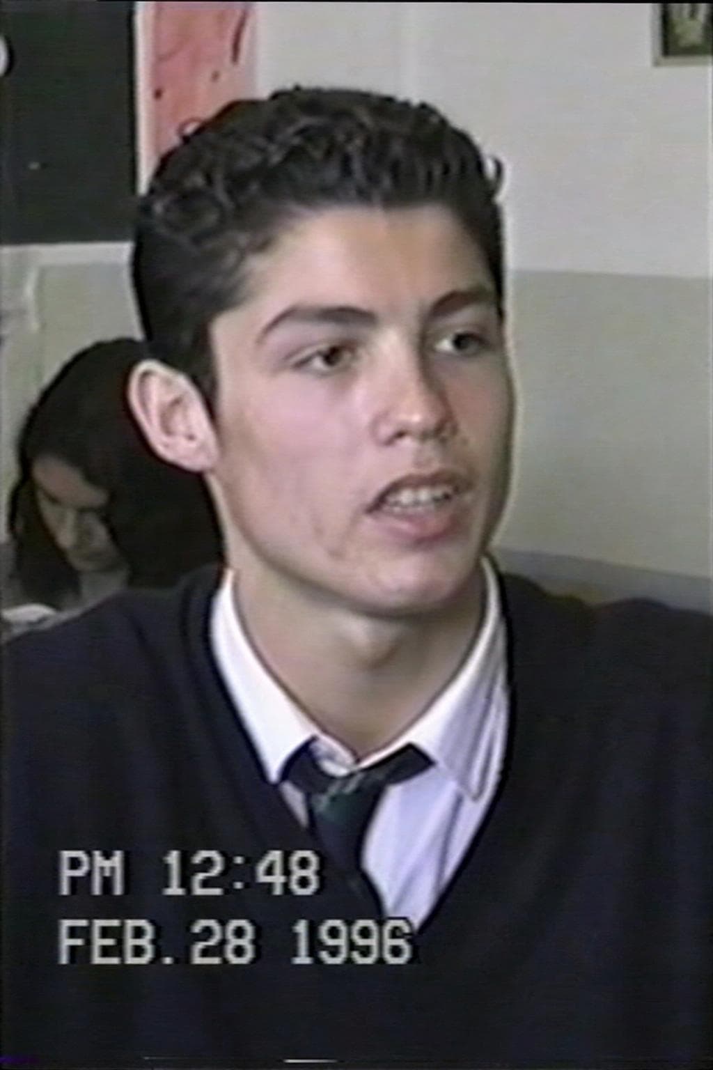 AI generated: Image of Cristiano Ronaldo from a VHS camcorder recorder in a highschool in Feb of 1996. Same grain ...