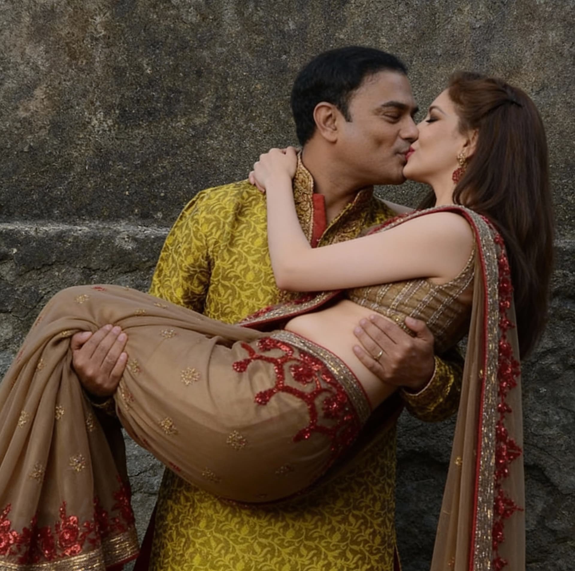 AI generated: The lifting the women on his arms and kissing the women lips 