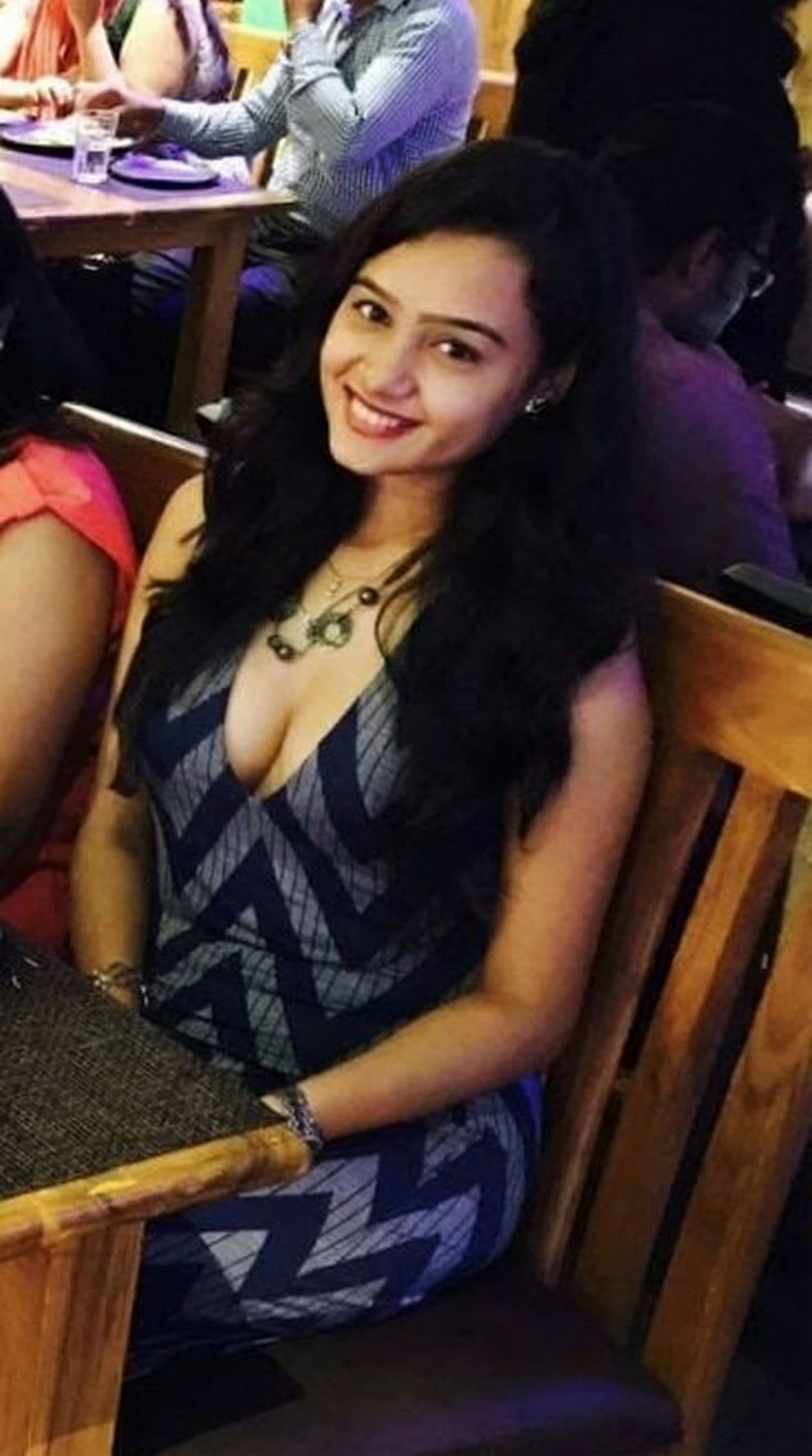 AI generated: Very deep cleavage visible half of the chest visible 
