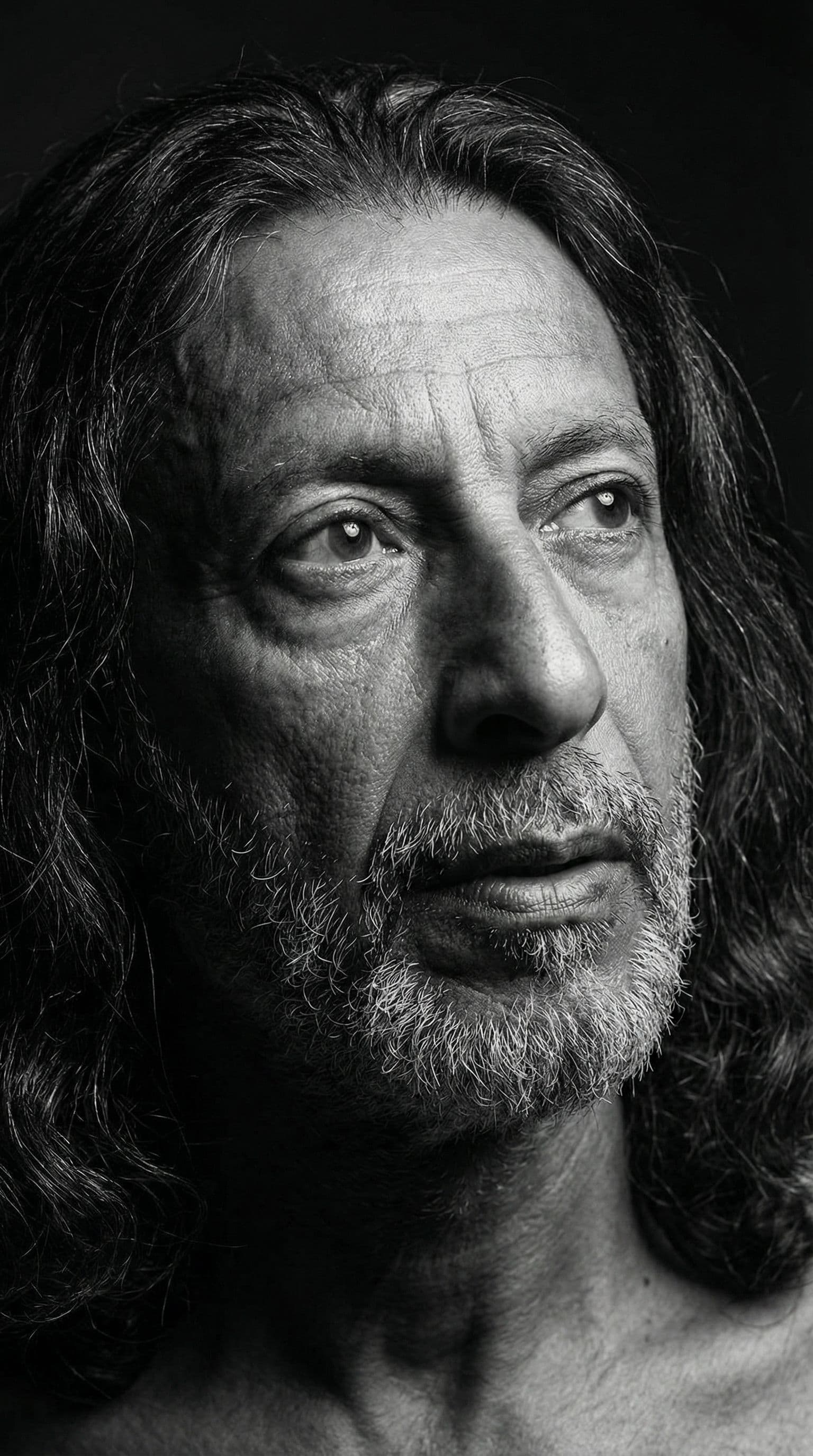 AI generated: Portrait of a man with long, wavy hair, looking up and to the side. Black and white with strong chia...