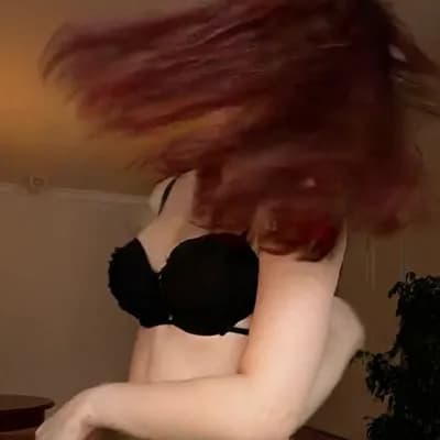 AI generated video: spitting on her own chest 