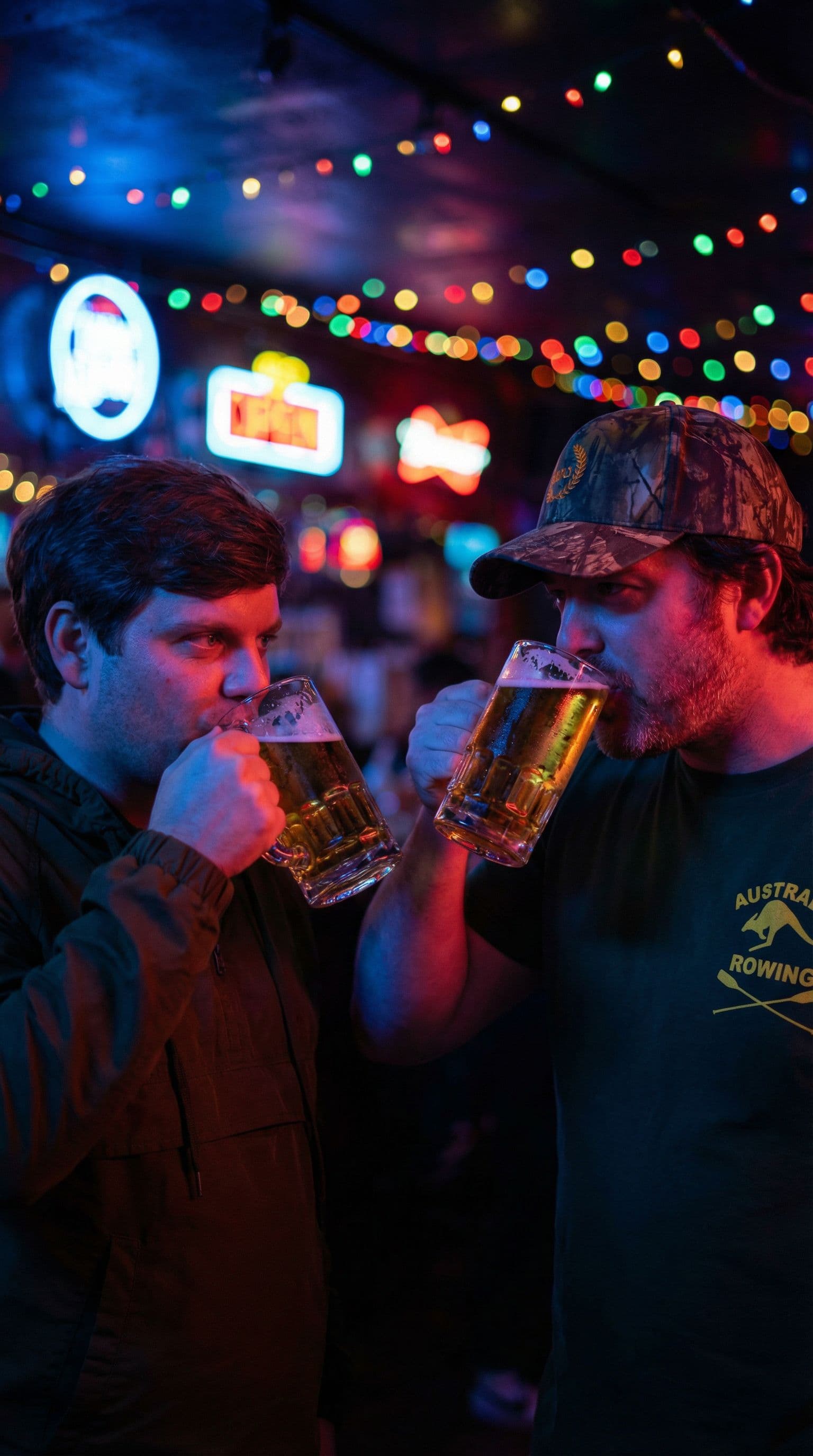 AI generated: have these two guys drinking beer in a ambient club with neon lights in the backgrouund. make it rea...