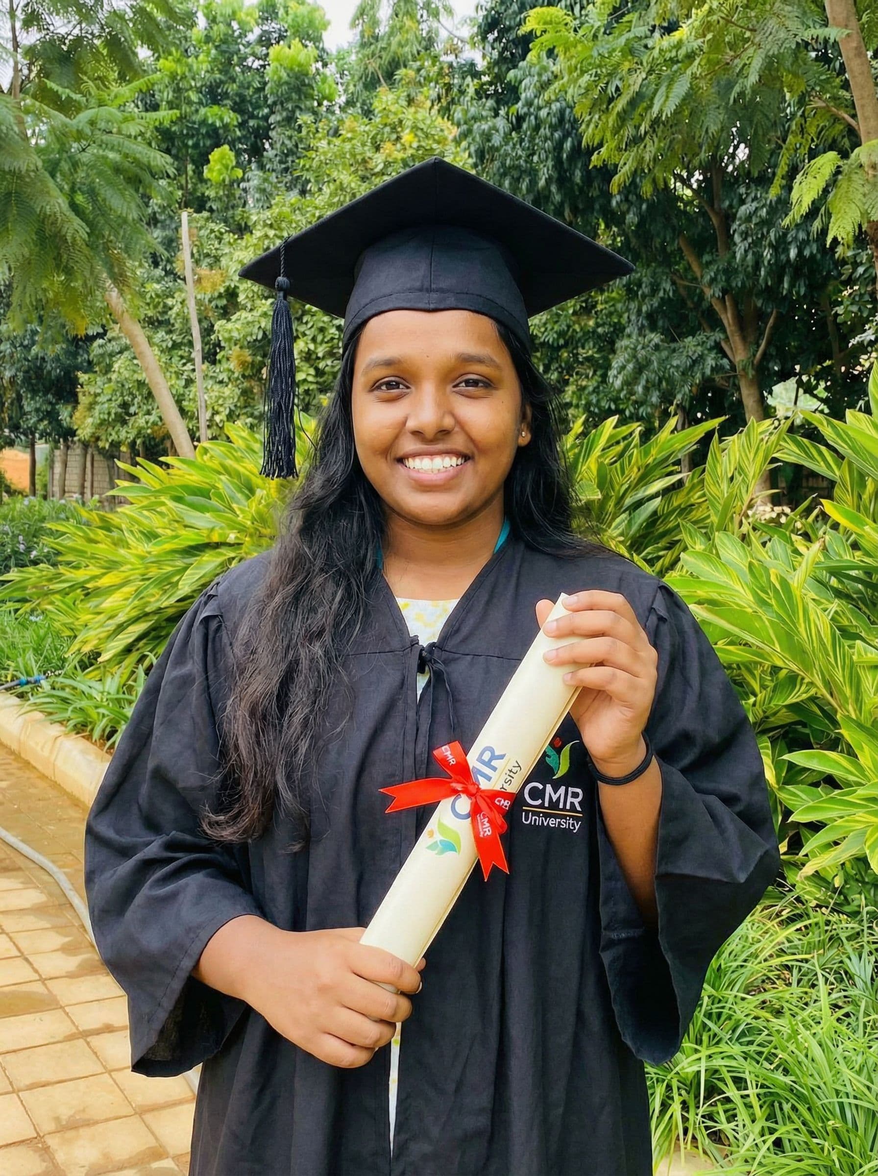 AI generated: Create a graduation image using cmr logo and you should be in graduation attire and graduation certi...