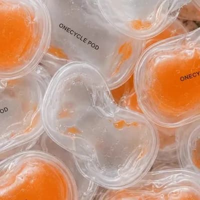AI generated video: Create a refined animated product shot from the reference image of multiple transparent ONECYCLE POD...