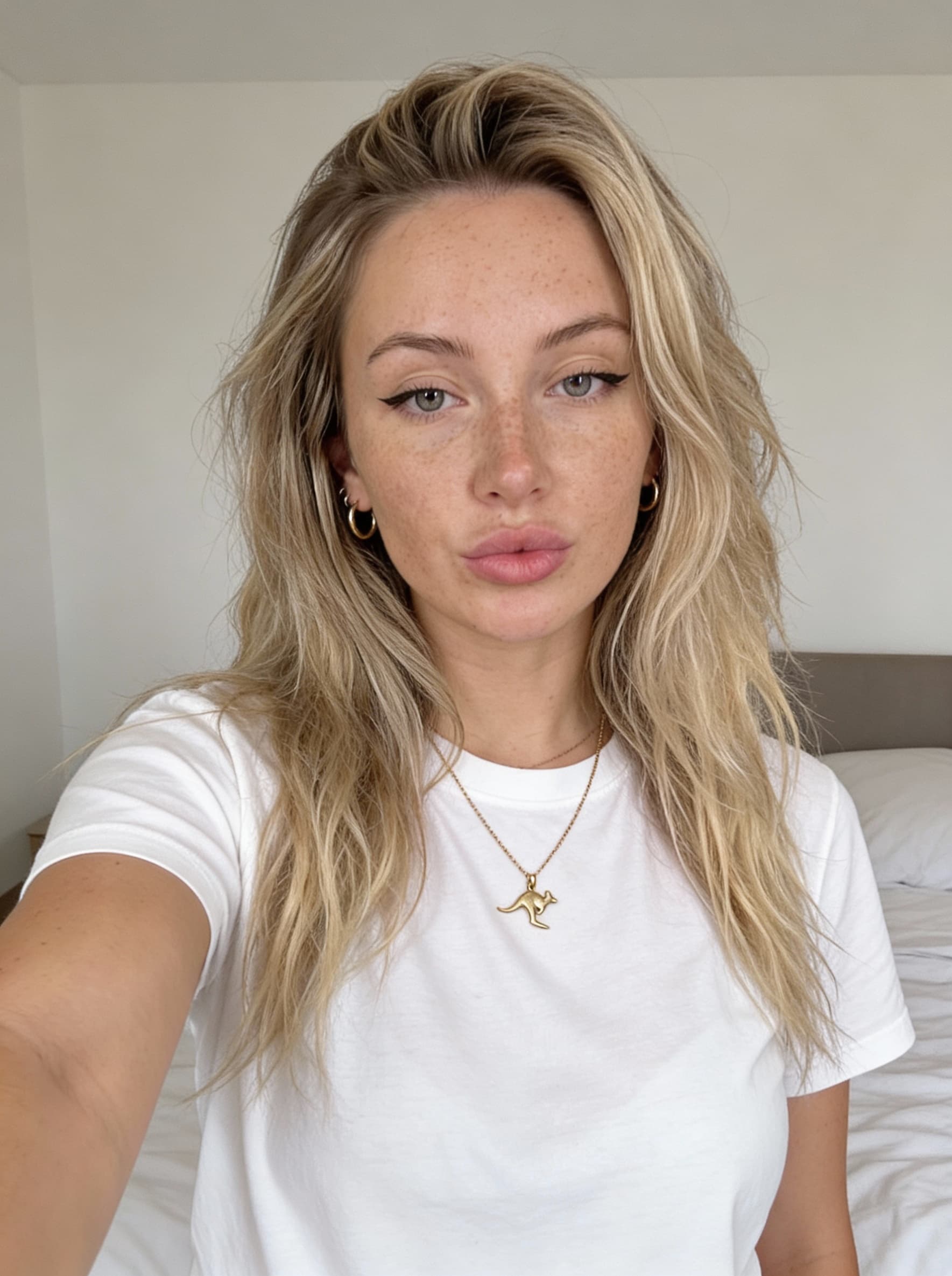 AI generated: Ultra-realistic close-up selfie of the same female from the uploaded reference image, preserving her...